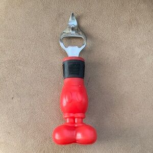 Disney Bottle Opener
Red Mickey Mouse bottoms 🙂
Approximately 7”